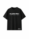 A black short-sleeve t-shirt with 'KLEN RX+' printed in white across the chest, accompanied by the words 'SCIENCE / PERFORMANCE / LONGEVITY' underneath. A small black brand label is visible near the lower hem.